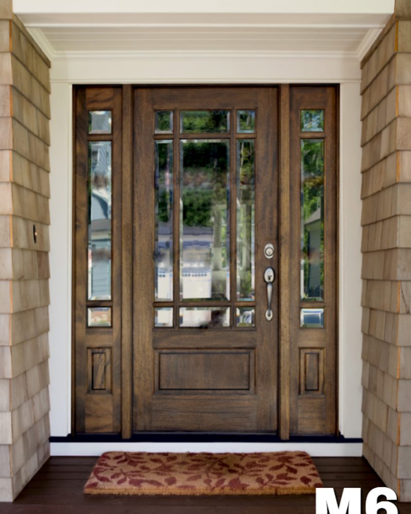 M6 mahogany single entry door flanked by two sidelights, in a shingled entryway