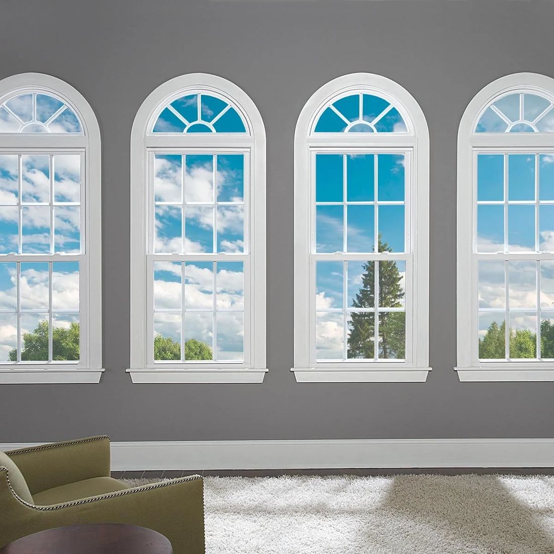 Arched Atrium double hung windows in a room with pale walls